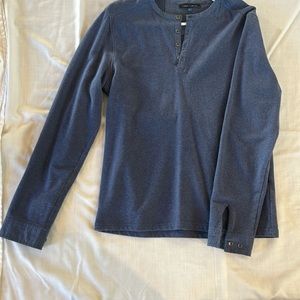 Cotton Henley with metal snaps.